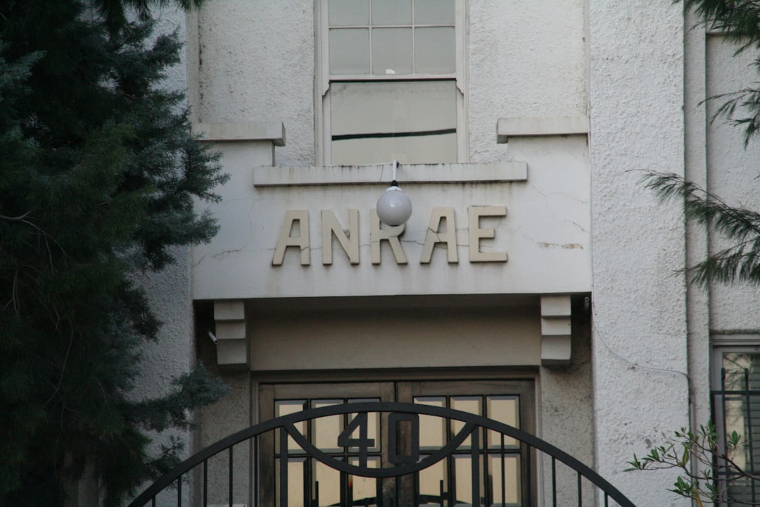 Building entrance with anrae sign above doors.