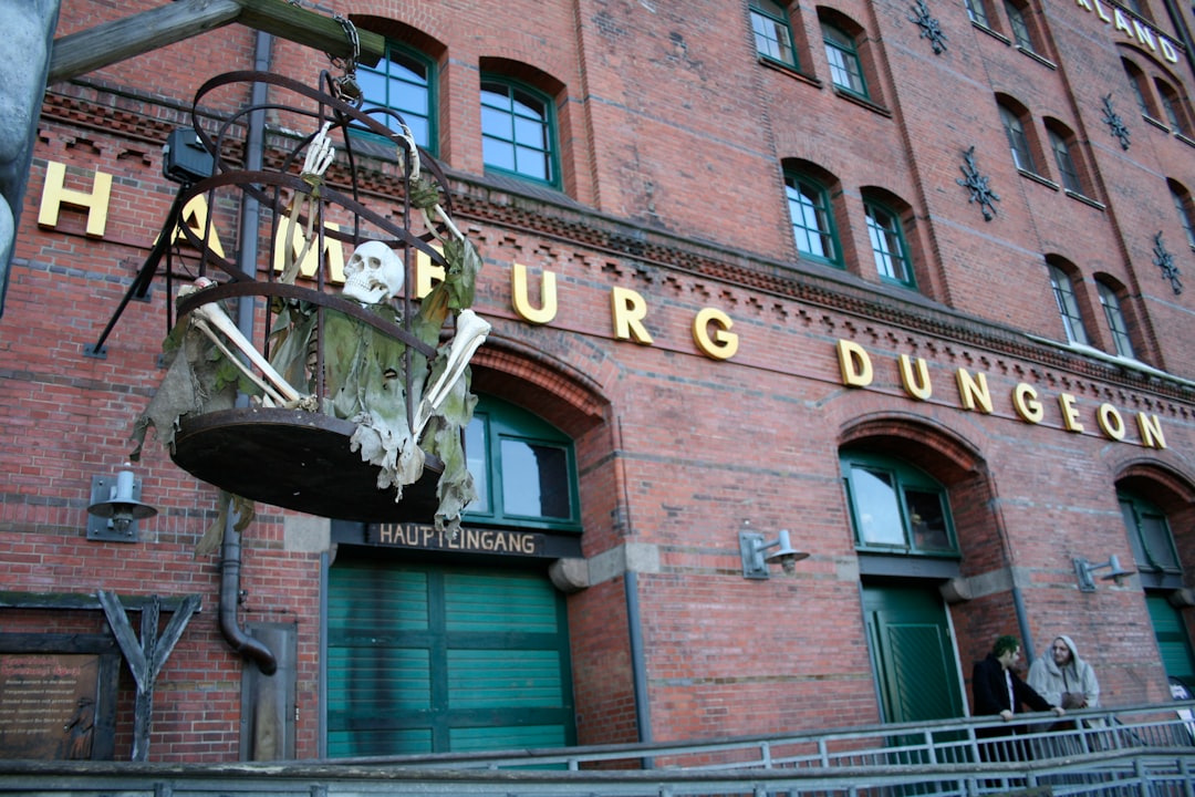 A large brick building with a sign on the front of it